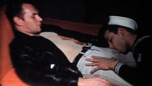 A sailor ends up in a 3some with a hottie & a leather man 