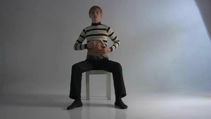Good-looking little fellow demonstrates his body and starts playing with rod 