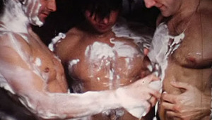 three Straight lover are playing with shaving cream in the shower 
