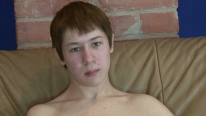 attractive teen is shaking his horny meat zealously during solo masturbation on the couch. 