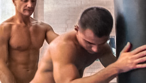 Kyle coaches boxer Harrick, pounding his booty on the gym mats 