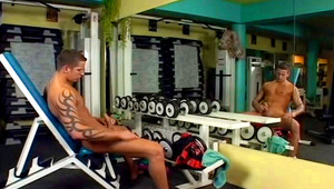 Handsome tattooed guy jacks himself off until he cums 
