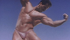 lovely beefy gay guy shows his athletic muscles to the camera 